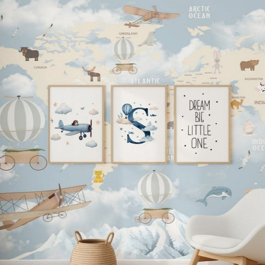 Children's room with world map wallpaper, chair, and decorative items.
