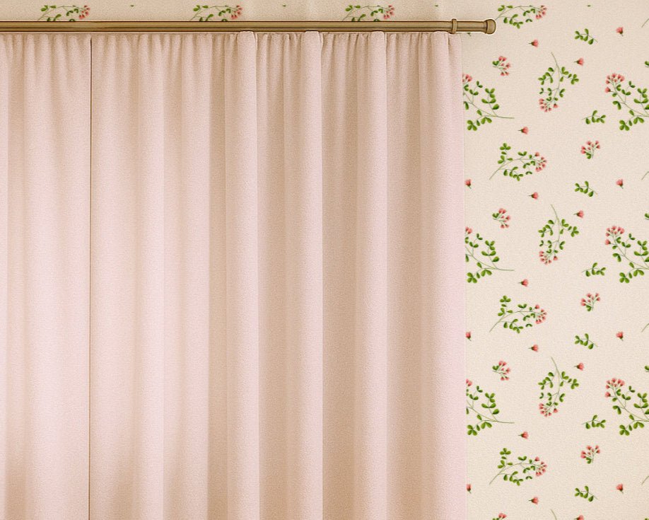 Pink curtain in front of floral wallpaper