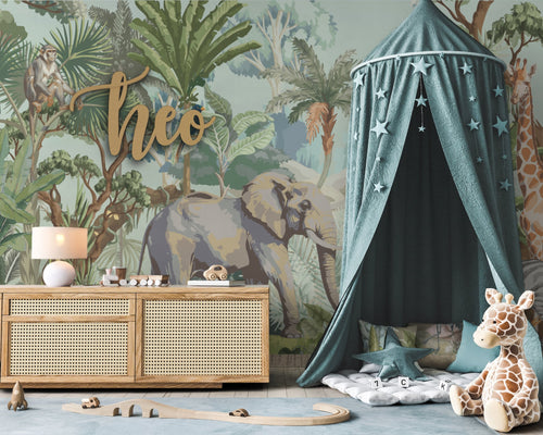 Children's room with jungle-themed wallpaper, wooden cabinet, and green play tent.