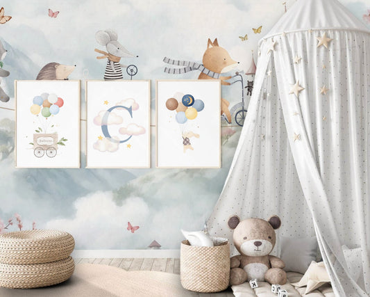 Children's room with wall art, teddy bear, and toys against a light blue wall.