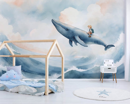 Children's room with a whale mural, bed, and decorative items.