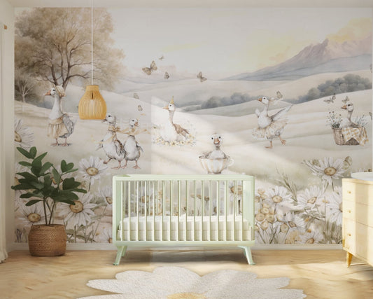 Nursery room with a green crib against a scenic wall mural.