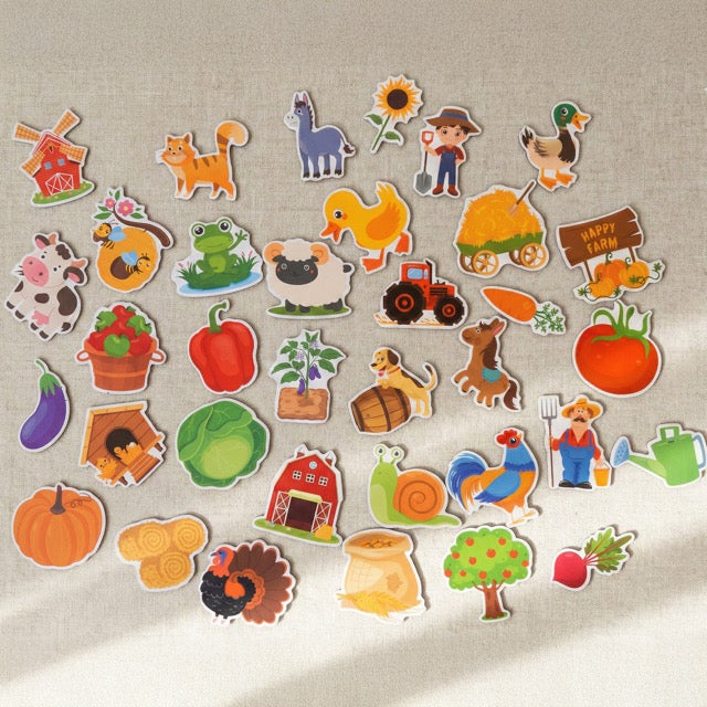 Complete 48-piece magnetic farm life set including animals, farmers, and tractors on a neutral background.