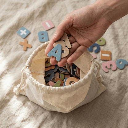Montessori magnetic wooden letters stored in fabric bag for toddler learning and play